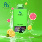 Fumot Tornado 35K disposable vape in Pink Lemonade flavor with lemon and grapefruit slices in a green splash background