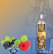 Blueberry and Sour Raspberry flavored vape device with a bold Gorilla-themed design, accompanied by fresh raspberries, blueberries, and blackberries.
